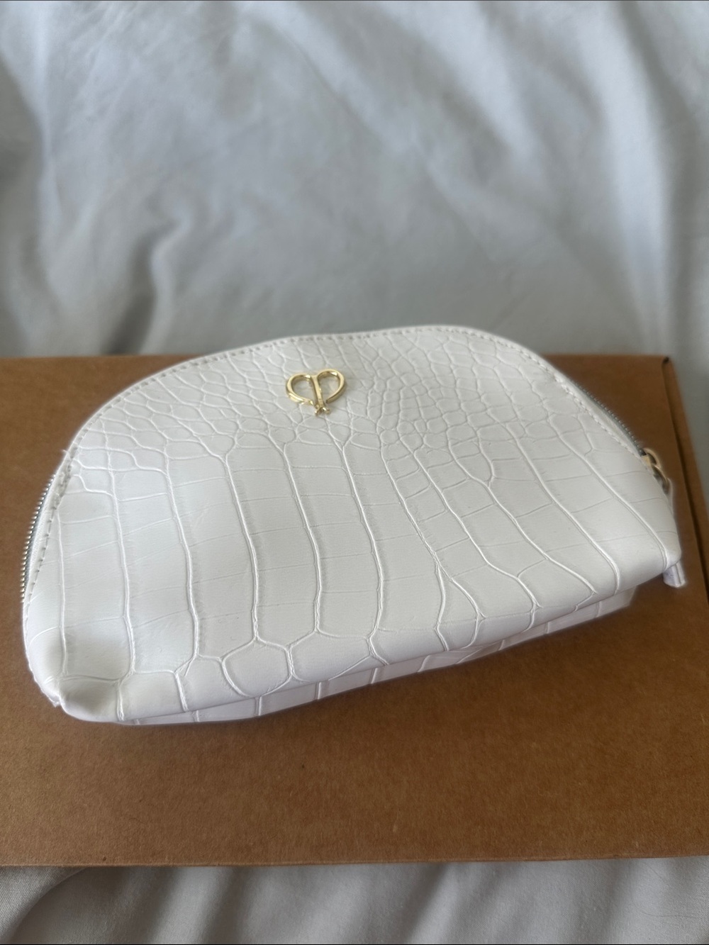 cle de peau White Croc-Embossed Cosmetic Pouch with Gold Heart Accent